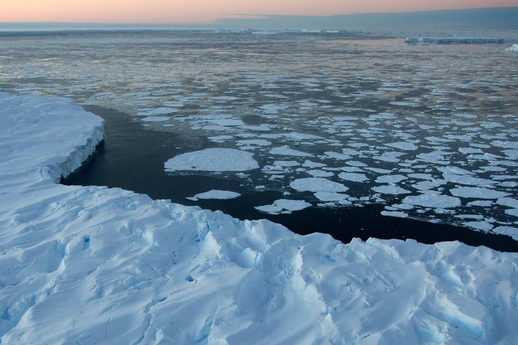 Giant tabular icebergs surrounded by ice floe drift in Vincennes Bay in the Australian Antarctic Territory in 2008. Photo: TNS