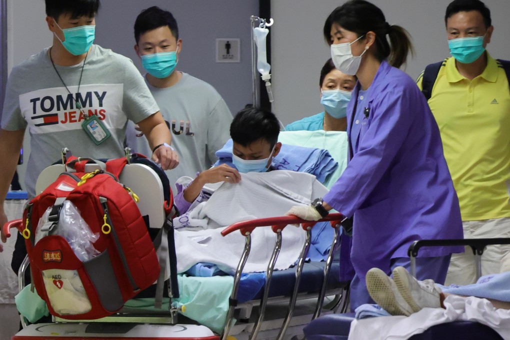 Matthew Tsang Hin-chit (centre), who was missing since October 4 and found near Lo Shue Tin in Ma On Shan Country Park, was airlifted to the Pamela Youde Nethersole Eastern Hospital for check-ups on October 11. Photo: May Tse
