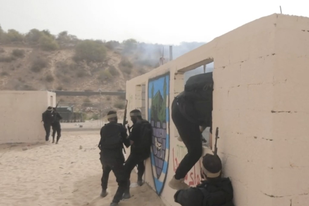 Hamas fighters take part in a live-fire exercise dubbed operation “Strong Pillar” outside Al-Mawasi, a Palestinian town in the Gaza Strip, in footage posted online in September. Photo: Hamas via AP