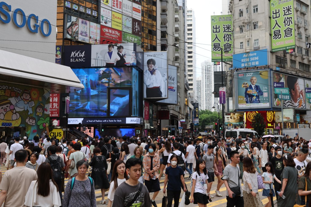 Shoppers on a busy street in Causeway Bay, Hong Kong in July 2023. Photo: Yik Yeung-man