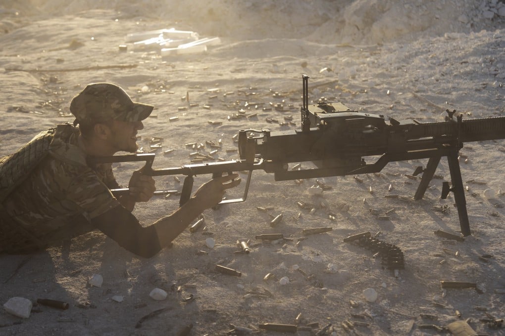 A Ukrainian soldier of the Donbas battalion takes part in military training. Russian attacks on Ukraine over a 24-hour period killed six people, local officials said on Sunday. Photo: EPA-EFE