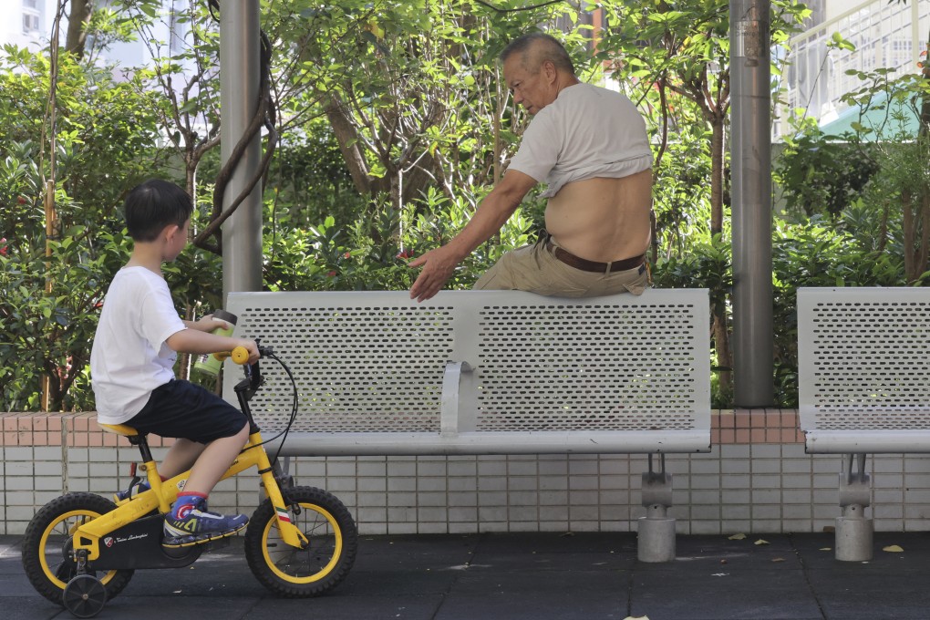 Young and old enjoying a park in Cheung Sha Wan on August 16.  Hong Kong is a rich, developed, self-contained and smart city ecosystem with excellent infrastructure. This makes it an ideal test bed. Photo: Jelly Tse