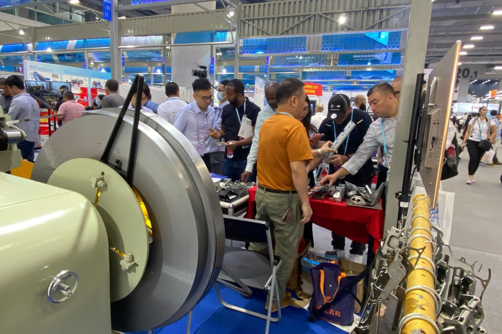 Exhibitors and buyers on the opening day of the Canton Fair in Guangzhou. Photo: He Huifeng