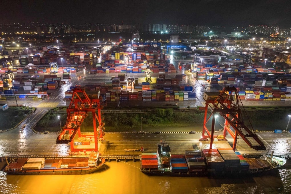 Cargo ships are seen berthed at Nanjing port in China’s eastern Jiangsu province. India’s current container traffic is less than 10 per cent of China’s but if the new port in Vizhinjam is able to lure more ships, it’ll give India a stronger footing in the global maritime trade. Photo: AFP