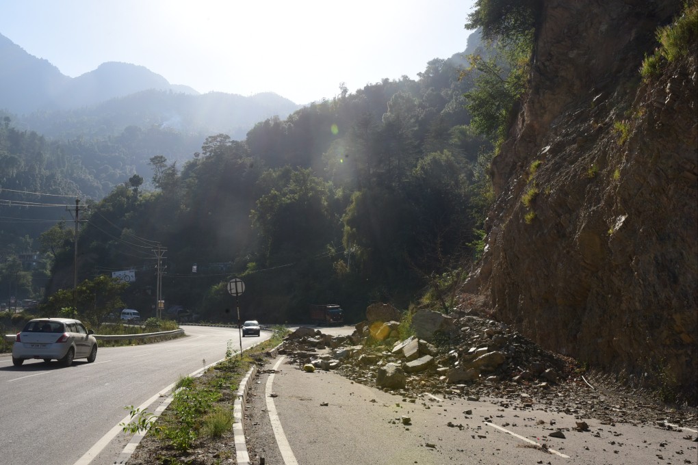 Landslides triggered by intense rains during the monsoon season have caused a shower of rocks and boulders across an arterial highway connecting India’s Himachal Pradesh state capital Shimla to Chandigarh, the state capital of the northern state of Punjab. Photo: Biman Mukherji