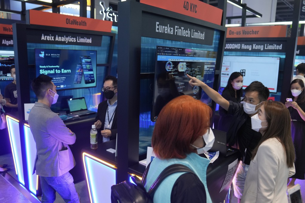 People check out exhibits at the 2022 edition of Hong Kong FinTech Week at the Hong Kong Convention and Exhibition Centre on October 31, 2022. Photo: Sam Tsang