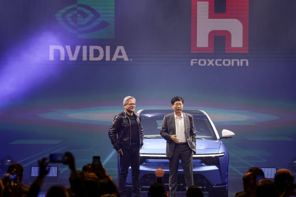Nvidia Corp chief executive Jensen Huang, left, and Foxconn Technology Group chairman Liu Young-way present the two companies’ latest collaboration at Hon Hai Technology Day in Taipei on October 18, 2023. Photo: Agence France-Presse