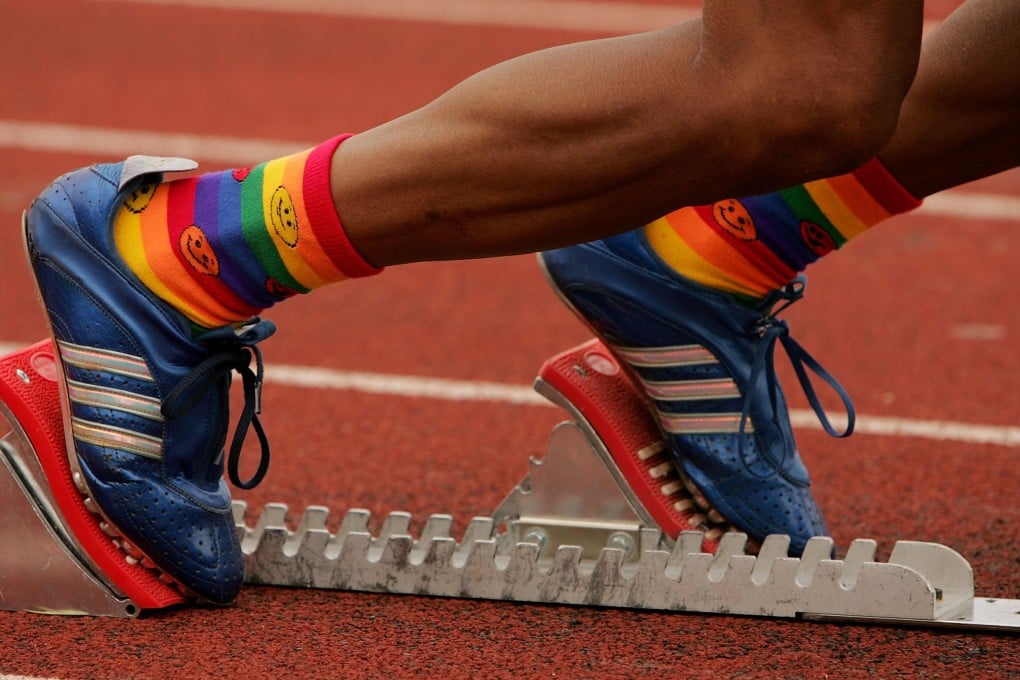 A runner with his feet in the starting blocks prepares to begin a track and field event at the Gay Games VII at Hanson Stadium in Chicago, Illinois on July 21, 2006. Hong Kong was chosen to host the games in 2017. Photo: Getty Images