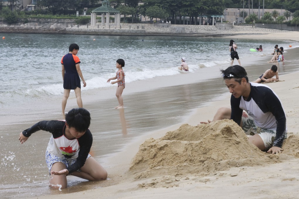 People enjoy a day out at Repulse Bay beach on July 26. Photo: Jonathan Wong