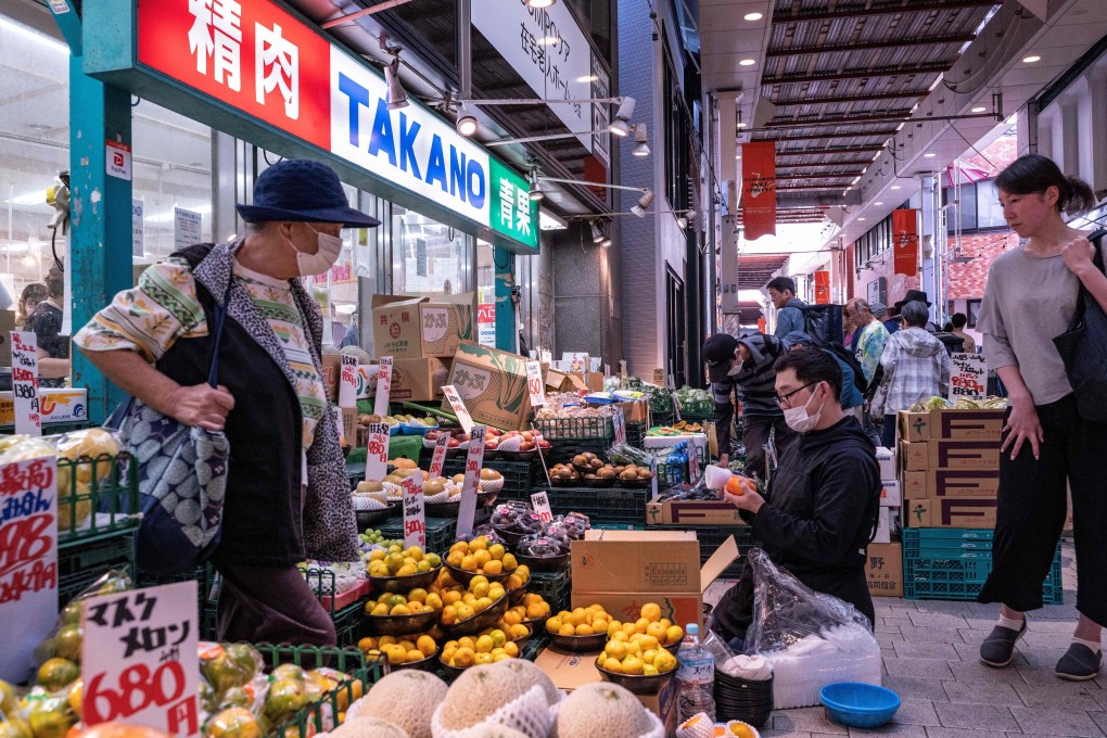 Fruit and vegetables for sale at the entrance to a supermarket in Tokyo on October 7. Household consumption in Japan fell in September for a seventh month in a row with wages remaining lacklustre, showing that Japan’s status as a safe haven amid growing geopolitical uncertainty is not bulletproof. Photo: AFP
