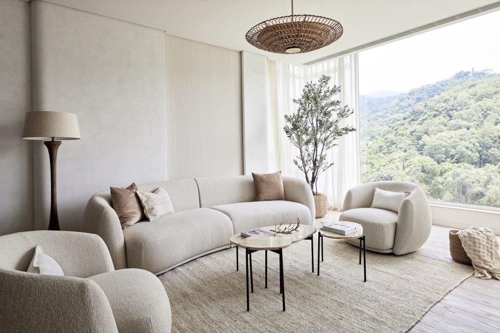 The living room of a home in Sha Tin, Hong Kong, designed by Liquid Interiors. The flat has been renovated for the second time in a decade, transitioning from a child-friendly home to a grown-up space. Photo: Simon J Nicol