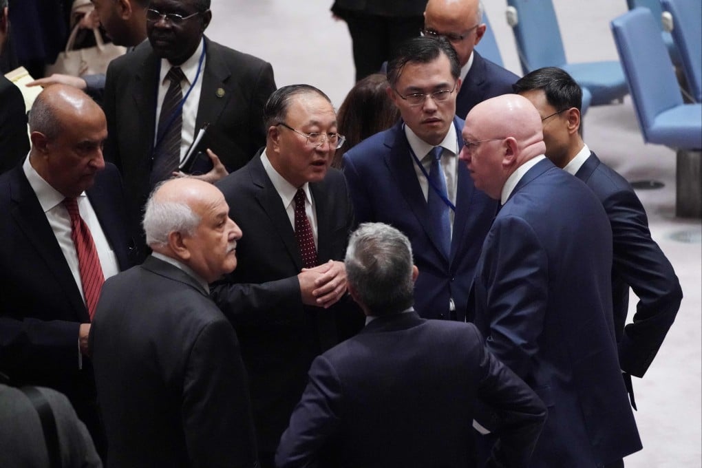 Ambassadors to the UN Riyad Mansour (of Palestine) and Zhang Jun (China) and Russian representative to the UN Vassily Nebenzia speak before a Security Council meeting on the situation in the Middle East, including the Palestinian question, on Wednesday in New York. Photo: AFP