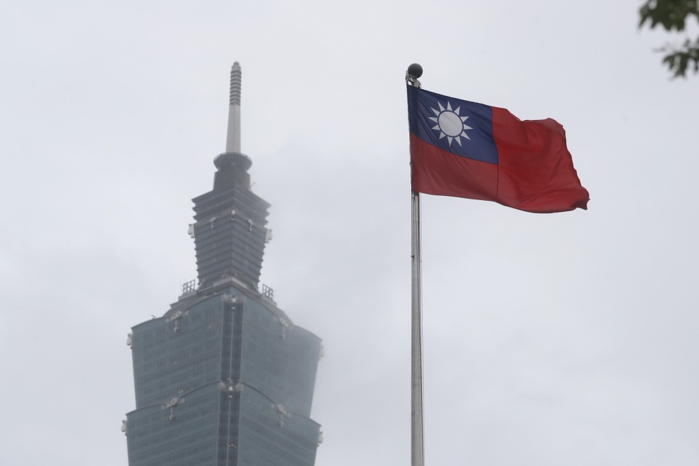 A Taiwan national flag flutters near the Taipei 101 building at the National Dr. Sun Yat-Sen Memorial Hall in Taipei on May 7, 2023. Photo: AP