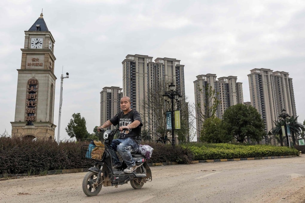 Beijing is facing a “monumental” challenge to unwind China’s local debt crisis, according to US rating agency Standard & Poor’s. Photo: AFP
