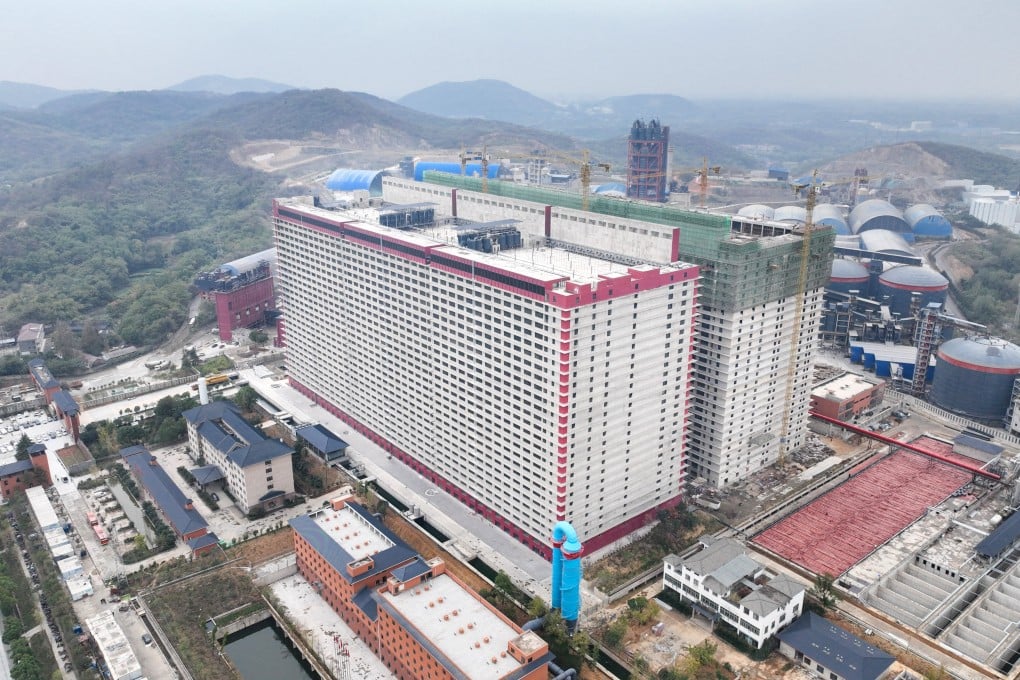 These two high-rise buildings in Ezhou, Hubei province, will be able to produce 1.2 million fully grown pigs a year when fully operational. Photo: Xinhua