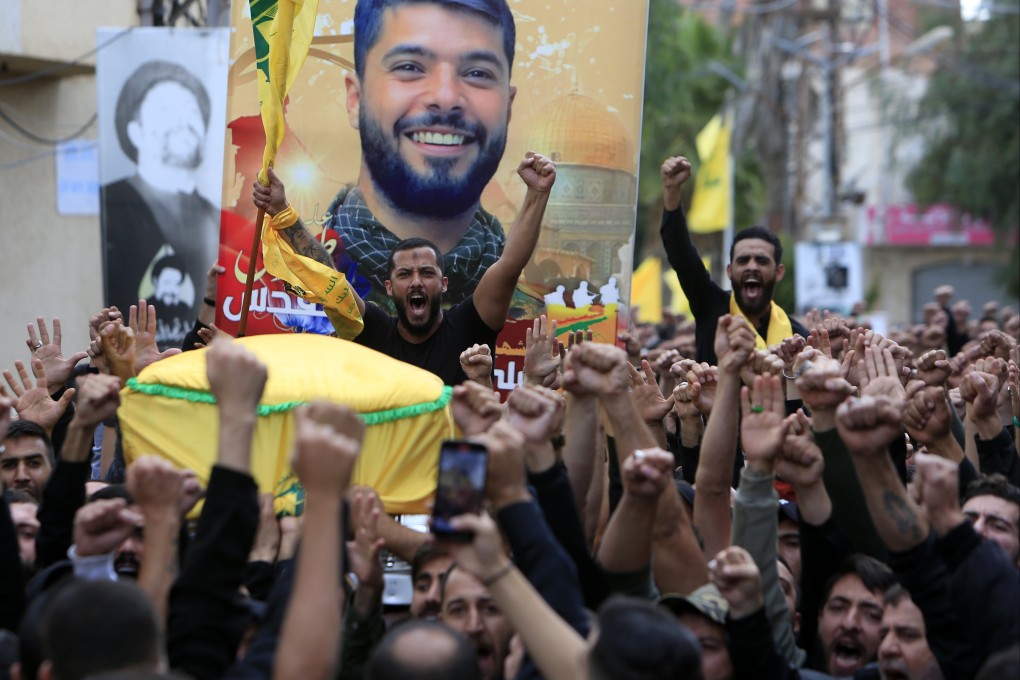 Mourners at the funeral of a Hezbollah fighting killed in fighting between the Iranian-backed militant group and Israel. The fighting has heightened concerns that the current conflict will spread. Photo: Xinhua