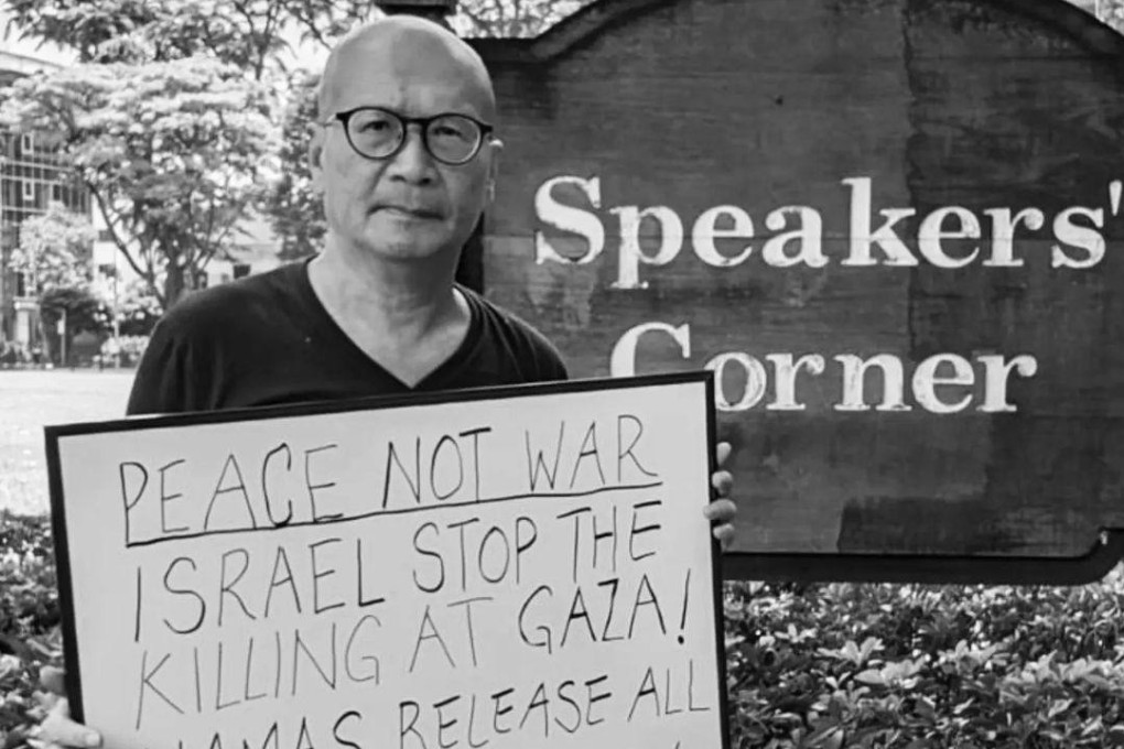 Activist Gilbert Goh holds up a sign on the Israel-Gaza war at Hong Lim Park in Singapore. Photo: Instagram.com/goh.gilbert