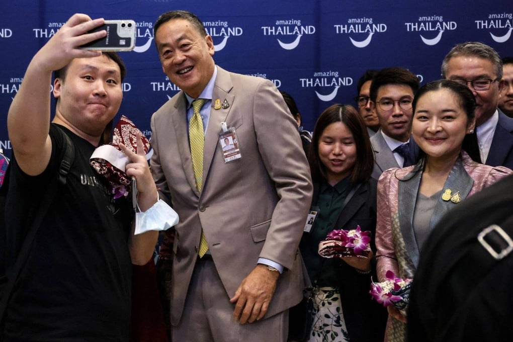 Srettha Thavisin, Thailand’s prime minister, poses for photographs with visitors during an event in Bangkok, in this file photo from September 2023. Photo: Bloomberg