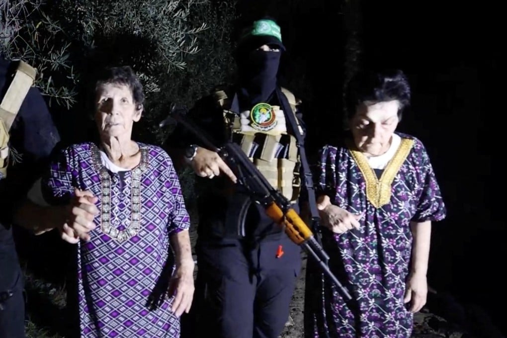 Yocheved Lifshitz and Nurit Cooper, who were held hostage by Hamas militants, being released. Photo: Al-Qassam Brigades, military wing of Hamas via Reuters
