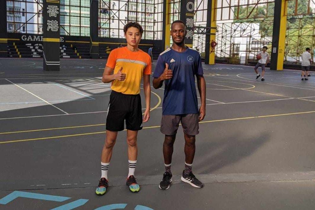 Moses Wu with trainer James Nortey (right) during his return to Hong Kong. Photo: Handout
