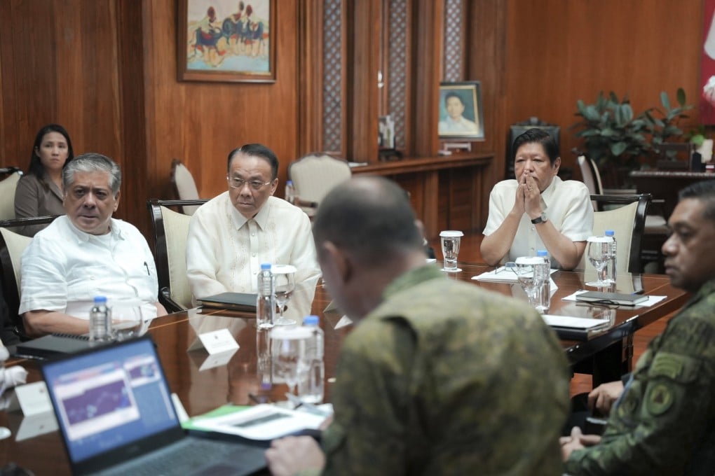 Philippine President Ferdinand Marcos Jnr (middle right), listens during an emergency meeting with the defence secretary and other top military and security officials to discuss the latest hostilities in the disputed South China Sea at the Malacanang presidential palace in Manila. Photo: AP