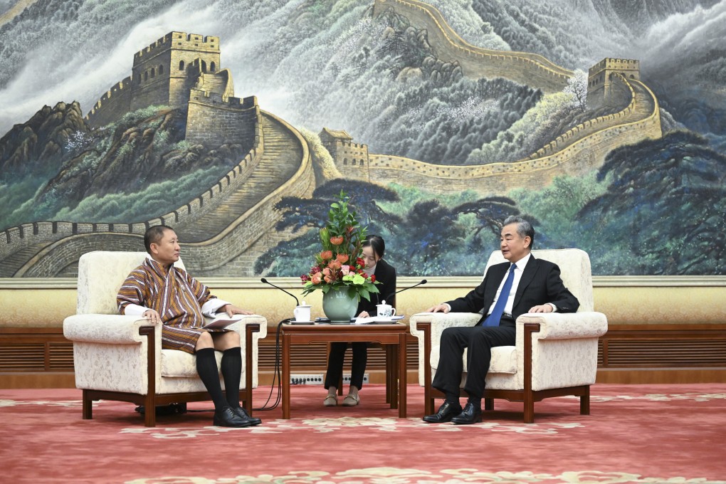 Bhutanese Foreign Minister Tandi Dorji (left) attends talks with China’s top diplomat Wang Yi in Beijing on Monday. Photo: Xinhua