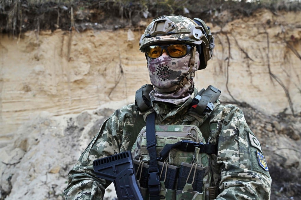 A Russian member of Ukraine’s army takes part in a training exercise near Kyiv on Tuesday. Photo: AFP