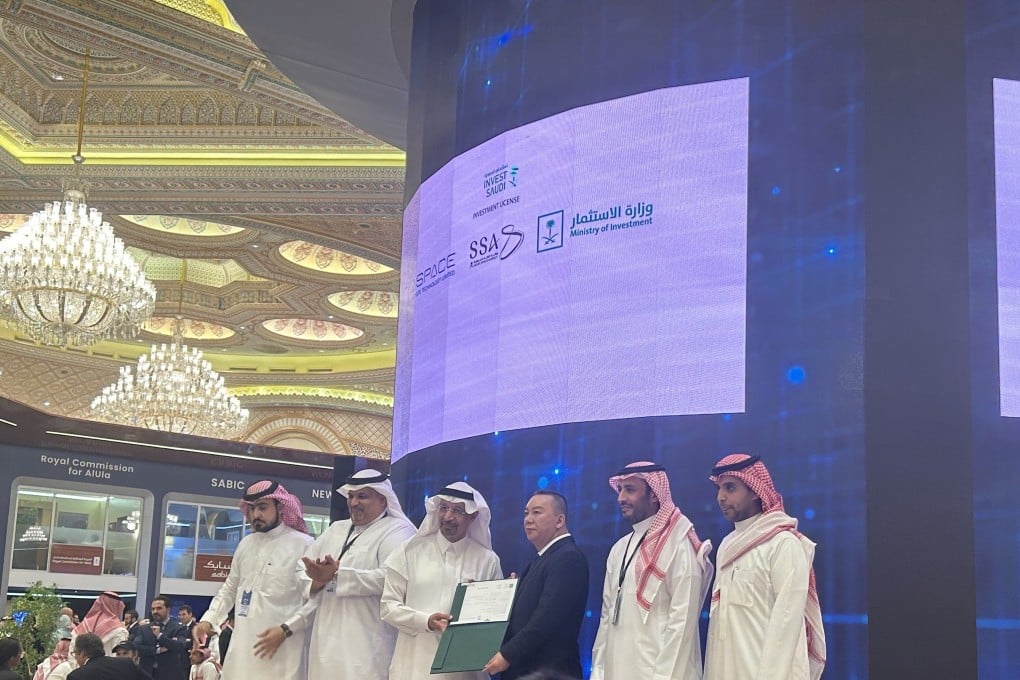ASPACE’s Sun Fengquan receives an aerospace licence from Saudi Arabia’s minister of investment, Khalid Al-Falih, at a ceremony during the FII conference in Riyadh. Photo: Kandy Wong