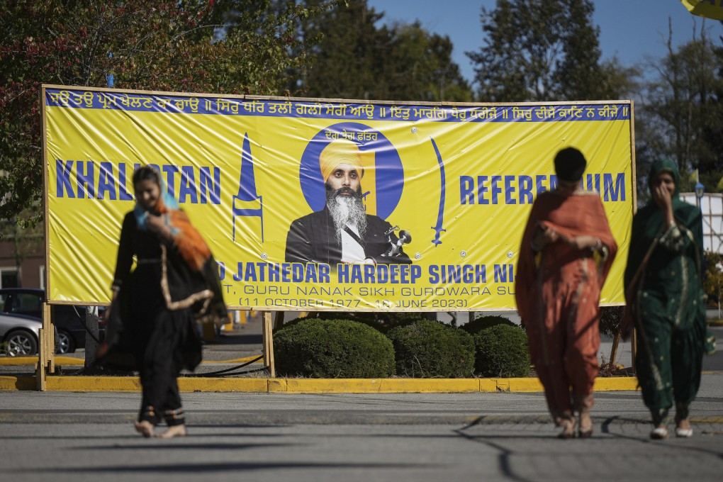 A photograph of Hardeep Singh Nijjar is seen on a banner outside the Guru Nanak Sikh Gurdwara Sahib in Surrey, British Columbia, Canada in September. Photo: Canadian Press via AP