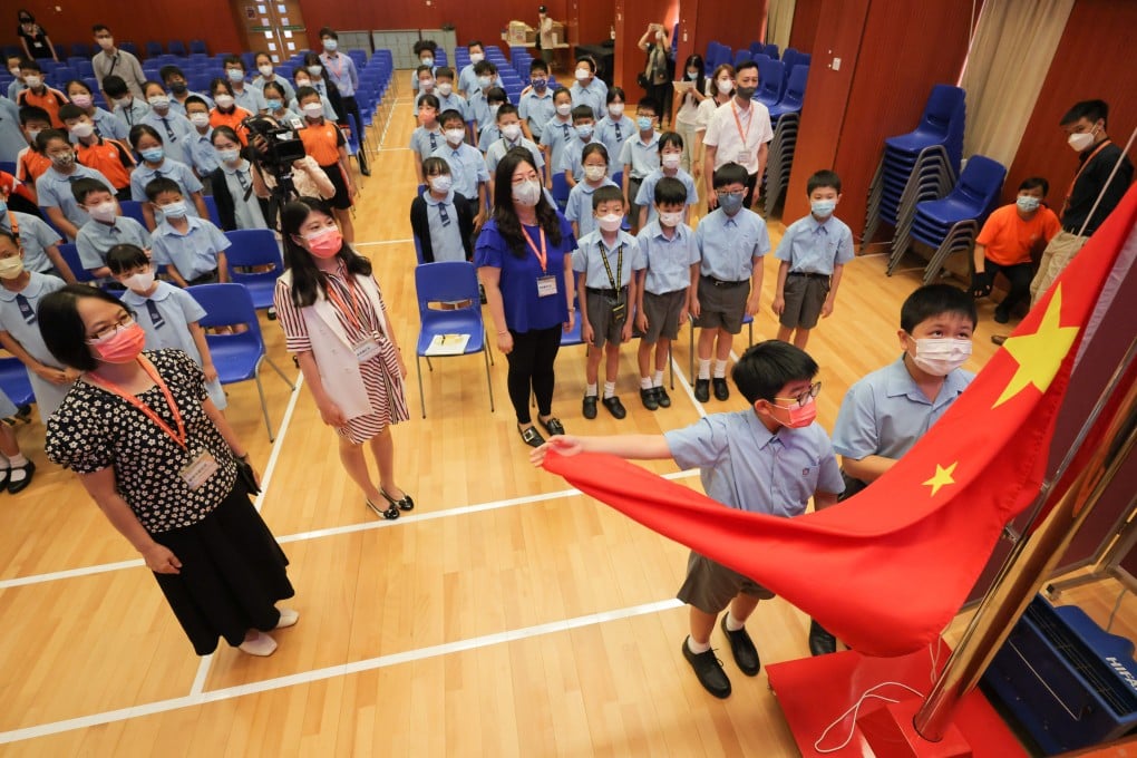 Primary school pupils raise the Chinese flag in Hong Kong. Photo: Jelly Tse