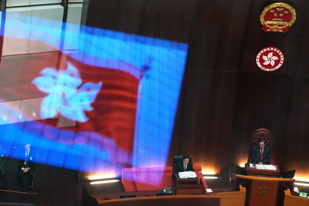 Chief Executive John Lee (left) attends the Question and Answer session at Hong Kong’s Legislative Council chambers, a day after delivering his policy address, as Legco president Andrew Leung listens, on October 26. Photo: Sam Tsang