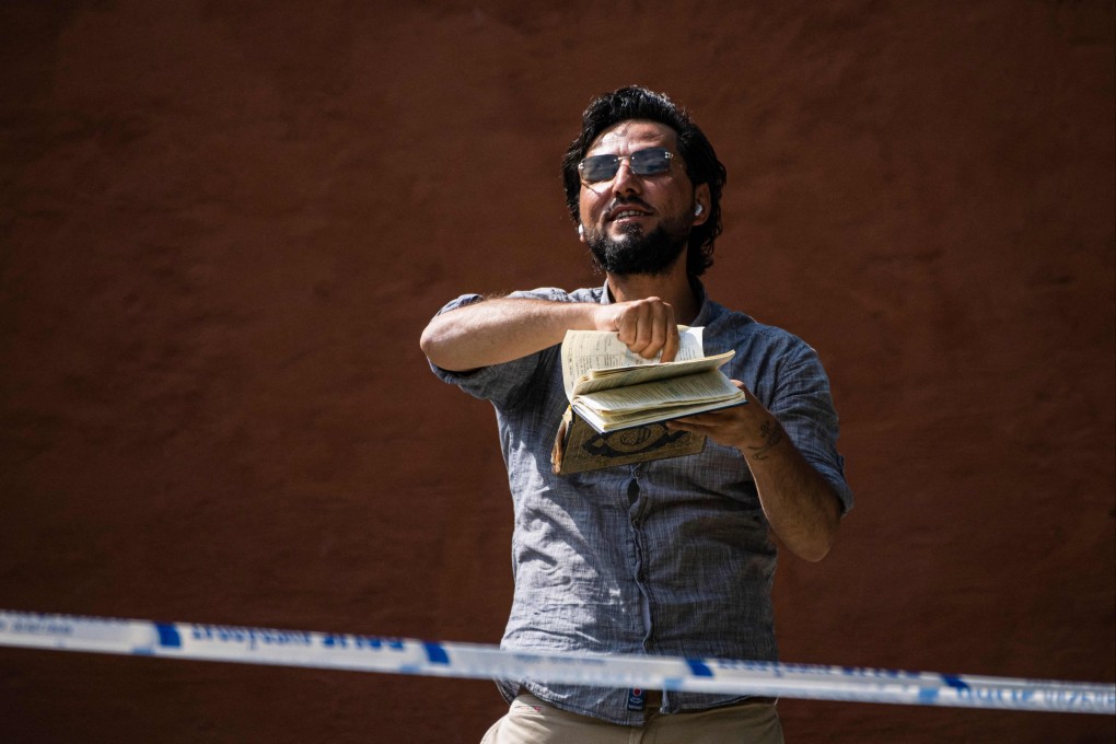 Salwan Momika protests outside a mosque in Stockholm on June 28. Photo: AFP
