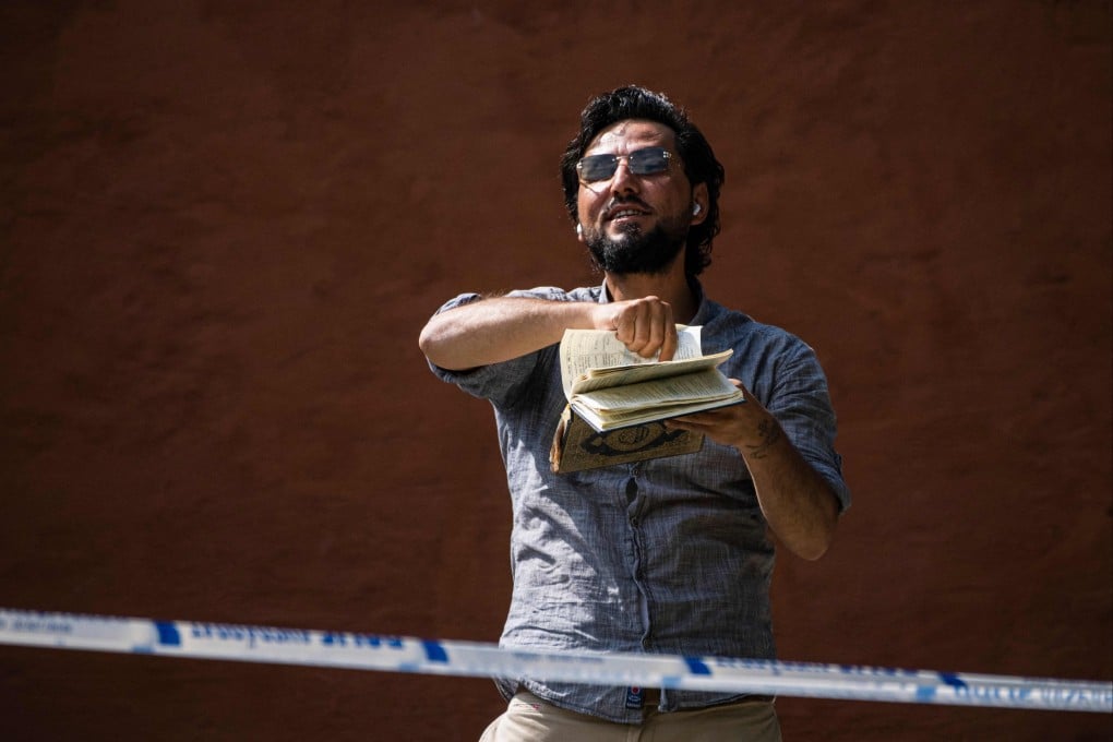 Salwan Momika protests outside a mosque in Stockholm on June 28. Photo: AFP