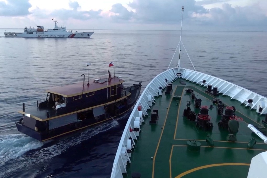 In the latest incident near the disputed Second Thomas Shoal, a Philippine boat (left) is blocked by a Chinese coastguard ship before they collided. Photo: Chinese coastguard/Reuters