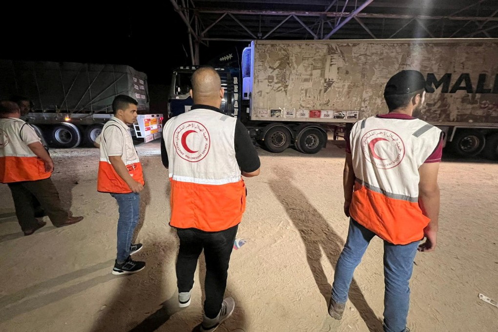 The Palestine Red Crescent receives a batch of humanitarian aid. Photo: Reuters