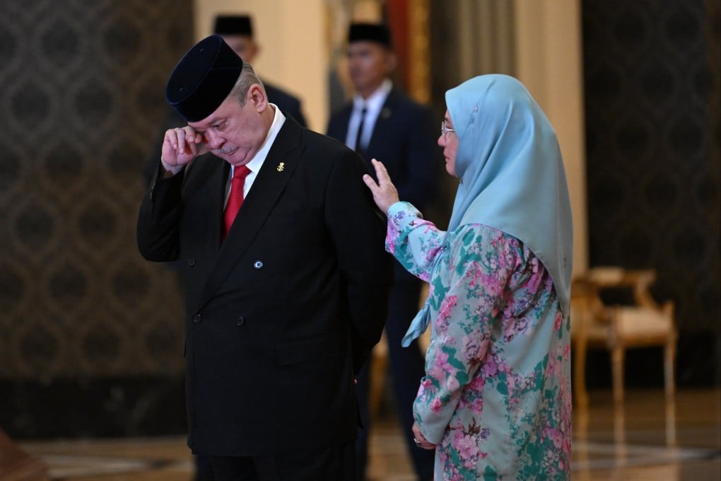 Sultan Ibrahim Ismail of Johor wipes his tears next to his sister and Malaysia’s Queen Tunku Azizah Aminah Maimunah Iskandariah after the election for the next king at the National Palace in Kuala Lumpur on Friday. Photo: EPA-EFE