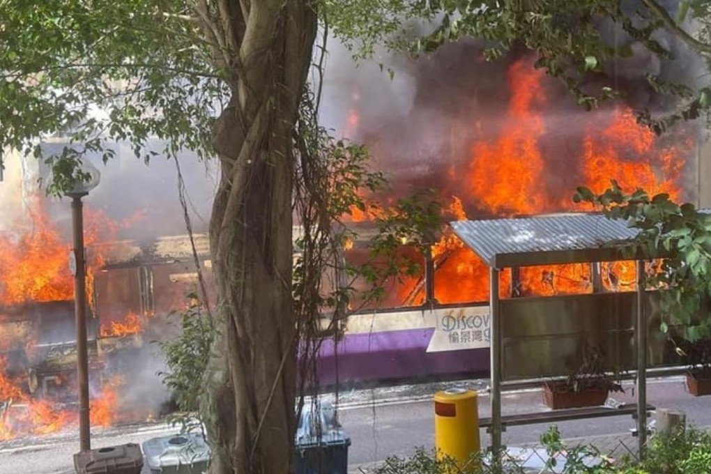 A bus burst into flames outside Peninsula Village in Discovery Bay on Friday. Photo: Brandon Wong