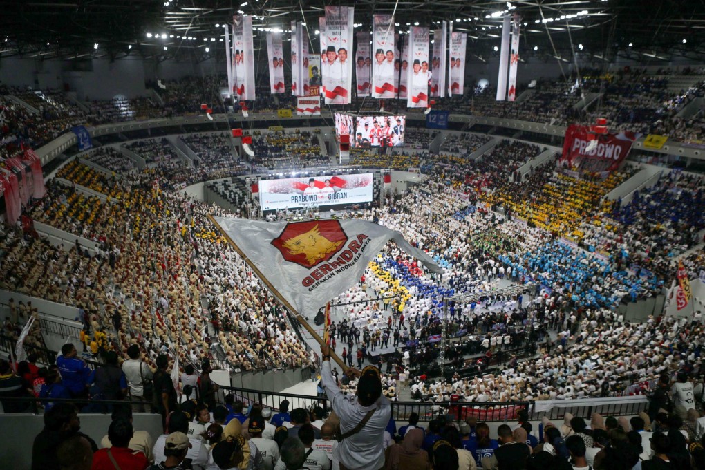 Supporters of presidential candidate and incumbent Defence Minister Prabowo Subianto and vice presidential candidate and incumbent Solo Mayor Gibran Rakabuming Raka, Joko Widodo’s son, attend an event on Wednesday in Jakarta before registering as candidates with the General Elections Commission. Photo: AFP