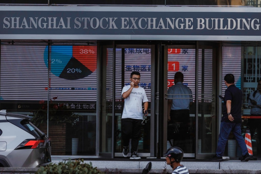People walk past the Shanghai Stock Exchange building in August 2023. Photo: EPA-EFE