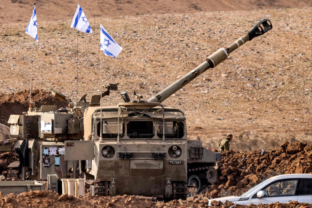 An Israeli army 155mm self-propelled howitzer is deployed at a position along the border with the Gaza Strip near Sderot on Friday. Photo: AFP