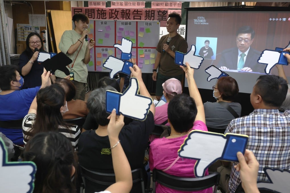 Residents react to the live broadcast of the chief executive’s policy address at a session organised by the Concern for Grassroots’ Livelihood Alliance, on October 25. Disagreements with the government on the right policy measures for Hong Kong should be accepted as part of a mature society. Photo: Edmond So