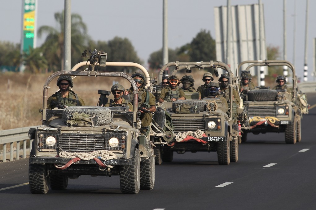 Israeli soldiers patrol along Israel’s border with Gaza on Saturday. Photo: Ilan Assayag/JINI via Xinhua