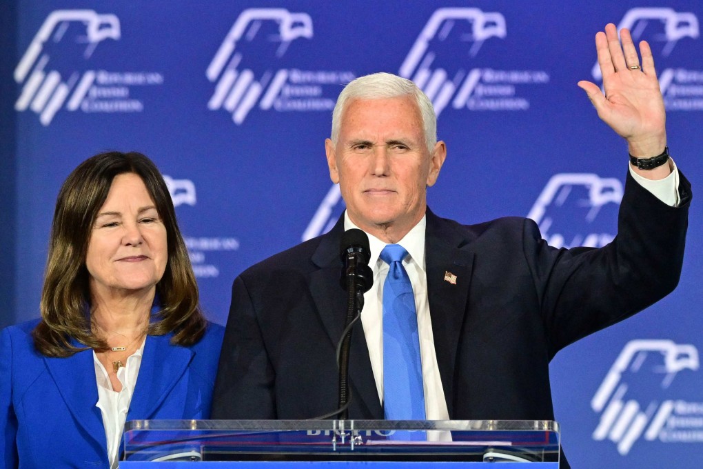 Former US vice-president Mike Pence, with his wife Karen Pence, acknowledges the crowd at an event in Las Vegas on Saturday after announcing he is dropping out of the 2024 presidential race. Photo: AFP