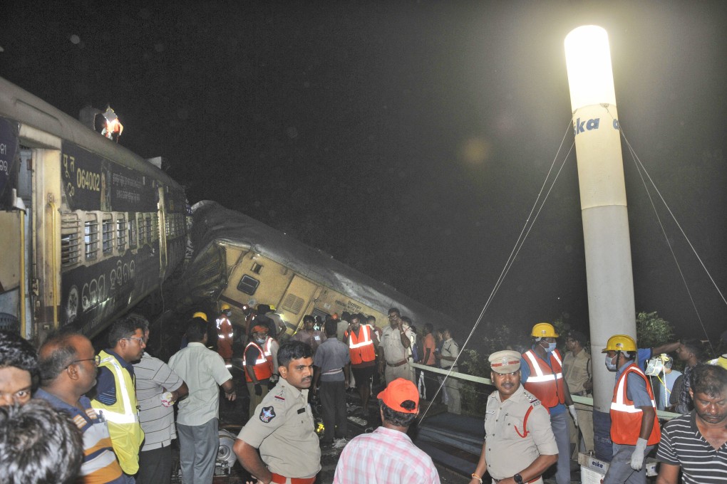 Two passenger trains collided in Vizianagaram district, Andhra Pradesh state, India on Sunday when an incoming train slammed into a stationary train, leading to derailment of at least three rail cars. Photo: AP