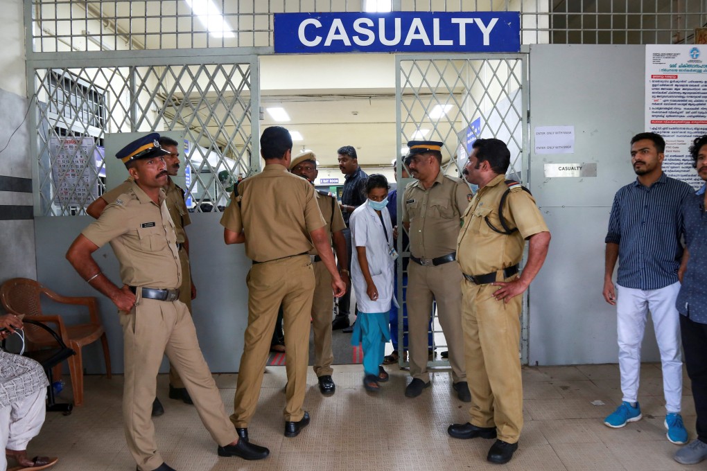 Policemen stand guard at the entrance of a hospital’s casualty ward where injured devotees were admitted after multiple blasts occurred during a religious gathering of Jehovah’s Witnesses in Kochi, India. Photo: Reuters