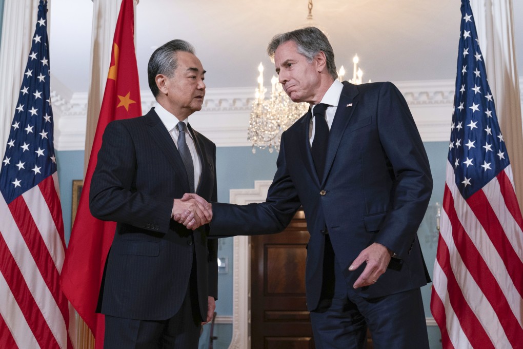 Chinese Foreign Minister Wang Yi (left) shakes hands with US Secretary of State Antony Blinken after a meeting in Washington on Thursday. Photo: AP