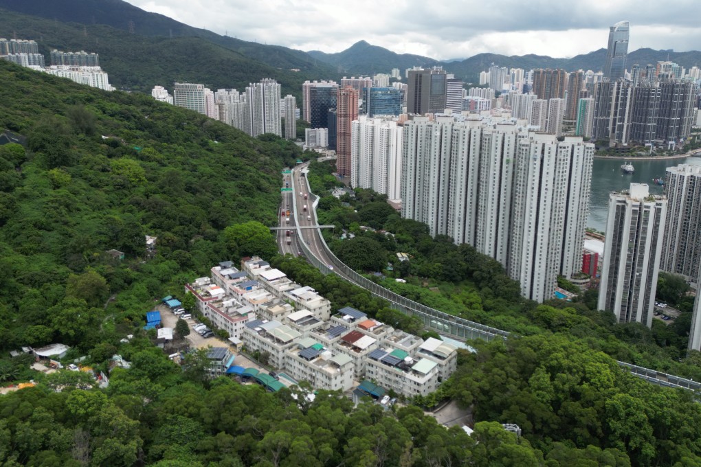 An aerial view of village houses at Yau Kom Tau in Tsuen Wan on August 24. Hong Kong’s property market has endured several difficult years, but prudent regulation and the government’s new-found interest in addressing chronic housing undersupply should avert any large-scale crisis.  Photo: Dickson Lee