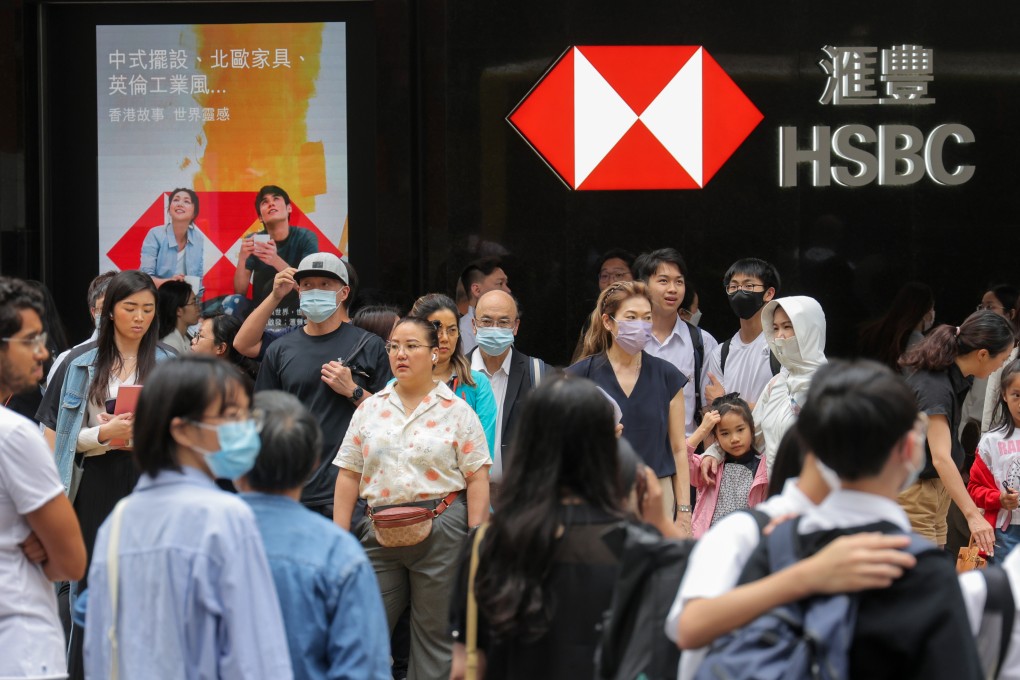 Pedestrians walk past an HSBC branch in Central, Hong Kong. Photo: Jelly Tse
