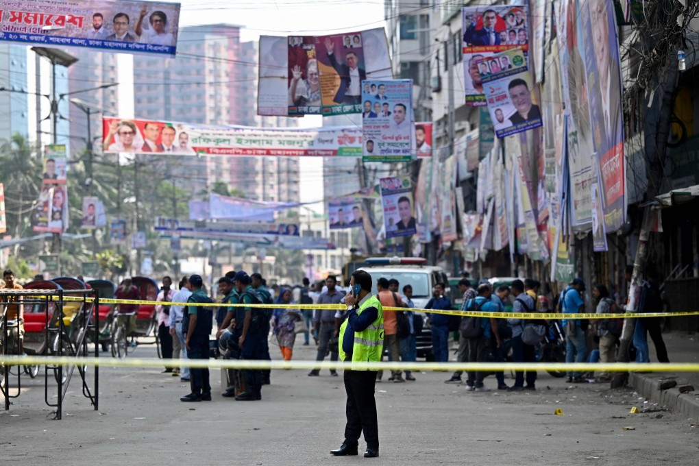A member of Bangladesh’s Criminal Investigation Department (CID) inspects a protest site after Bangladesh Nationalist party (BNP) activists held a rally in Dhaka, Bangladesh on Sunday. Photo: AFP