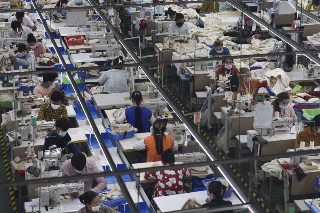 Garment workers make clothes at a factory in Phnom Penh, Cambodia. Apparel makers are seeing increasingly thinner profit margins as minimum wages creep up in the country. Photo: Xinhua